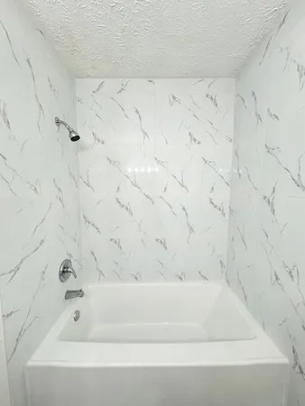 a bathroom with a bathtub