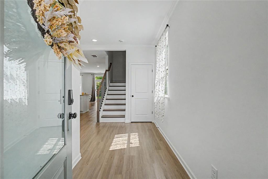 2310 Portrush Way Southeast Atlanta, GA 30339 - Photo 5 of 38 a view of entryway with wooden floor
