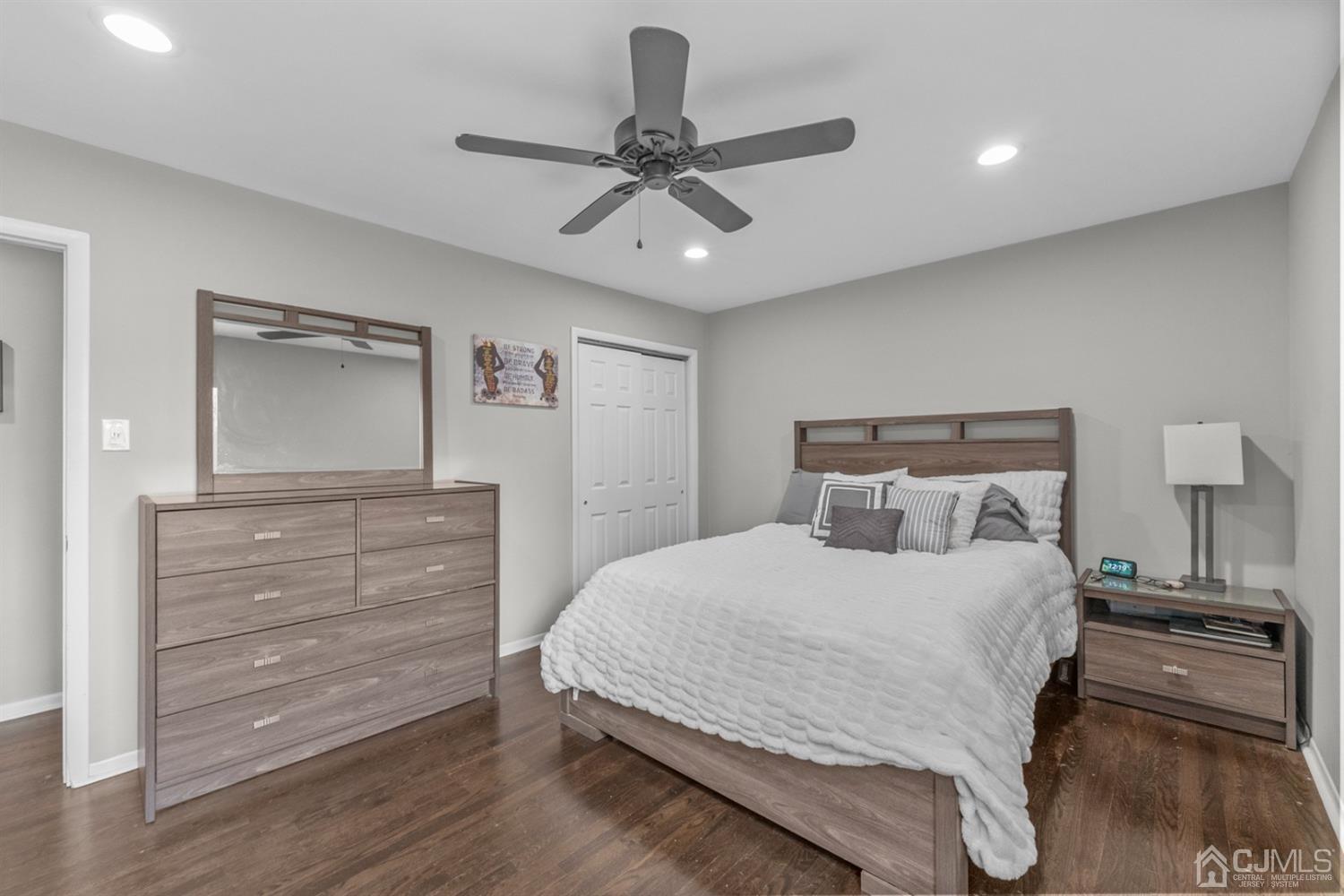 17 Dumas Road Old Bridge, NJ 08857 - Photo 9 of 19 a bedroom with a bed and a chandelier