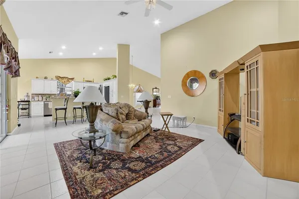 a living room with furniture and a rug