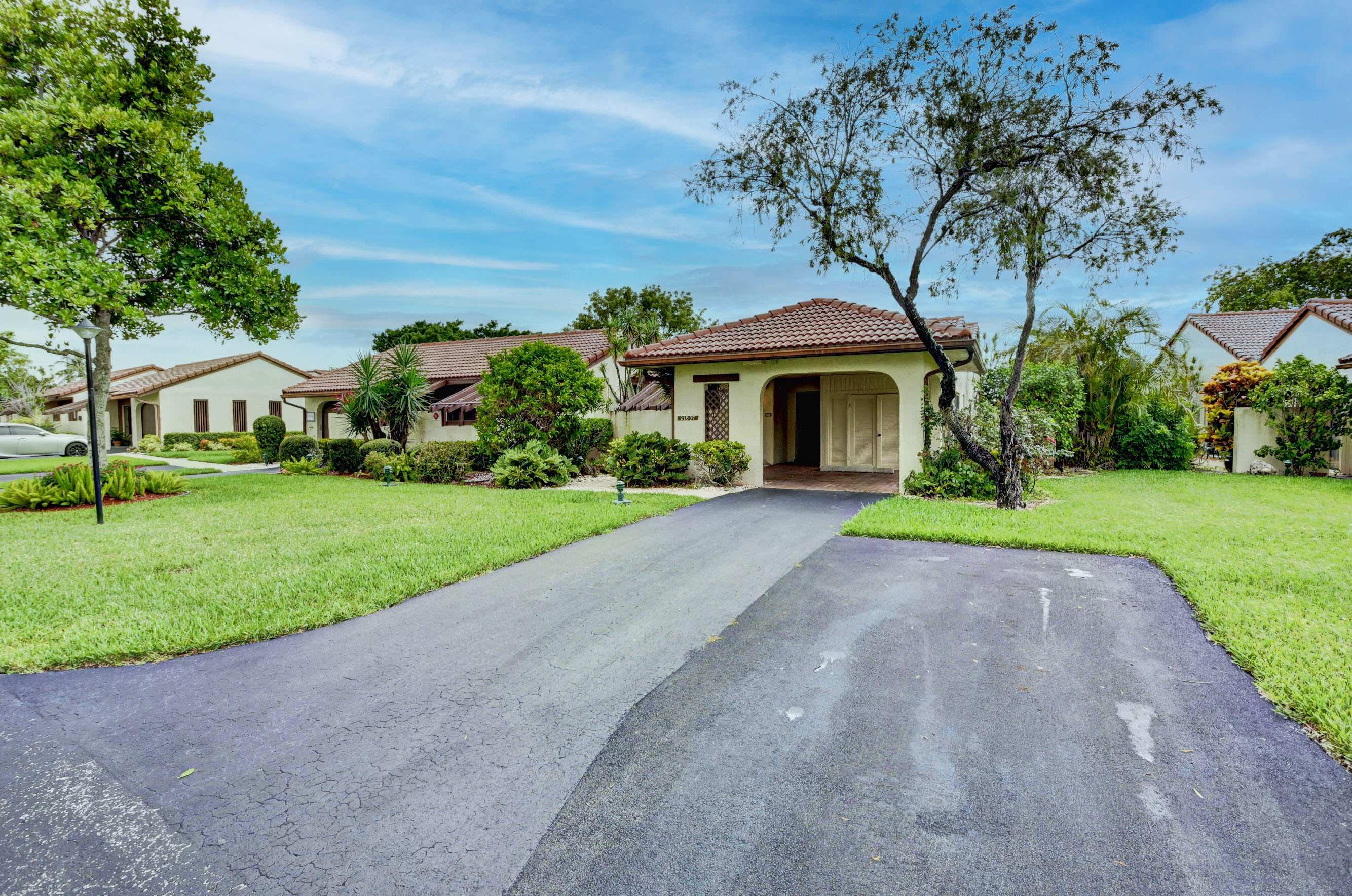 21897 Arriba Real, Unit 16B Boca Raton, FL 33433 - Photo 36 of 44 Extra driveway