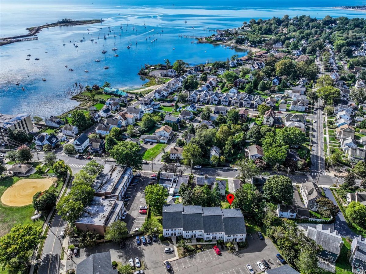 an aerial view of a houses with outdoor space