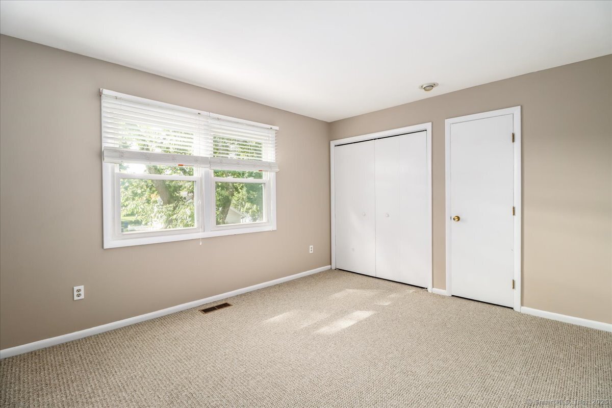 65 Ellsworth Street, Unit 302 Bridgeport, CT 06605 - Photo 15 of 40 a view of an empty room with a window
