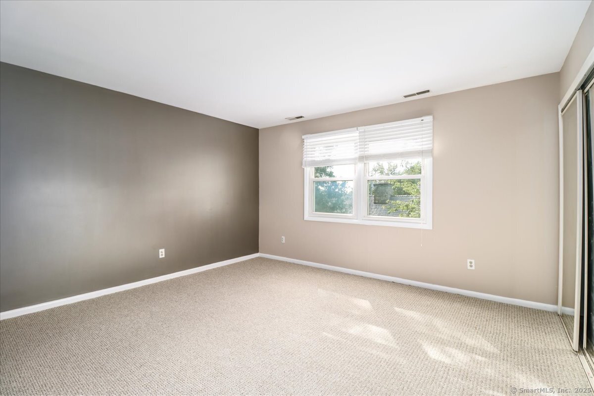 65 Ellsworth Street, Unit 302 Bridgeport, CT 06605 - Photo 23 of 40 Upper Level Primary Bedroom