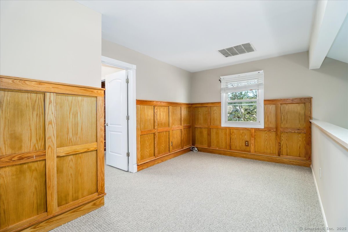 65 Ellsworth Street, Unit 302 Bridgeport, CT 06605 - Photo 31 of 40 an empty room with windows