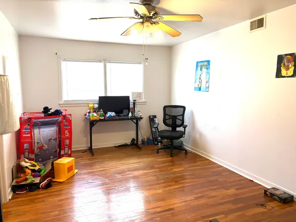 a workspace with furniture and window