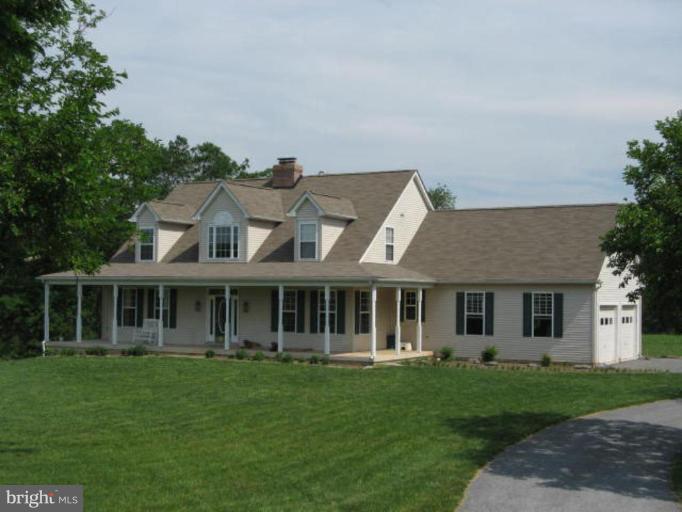 7791 Dollyhyde Road Mount Airy, MD 21771 - Photo 1 of 16 front view of a house with a yard