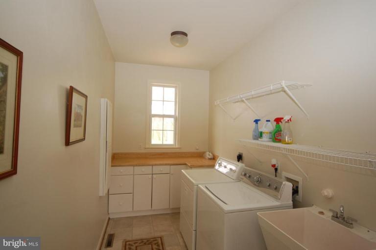 7791 Dollyhyde Road Mount Airy, MD 21771 - Photo 14 of 16 a bathroom with a sink and a mirror
