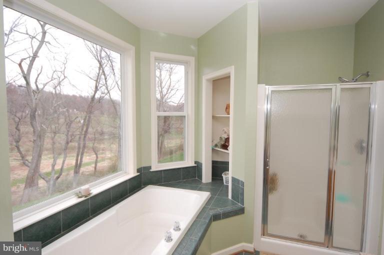 7791 Dollyhyde Road Mount Airy, MD 21771 - Photo 8 of 16 a living room with a large window