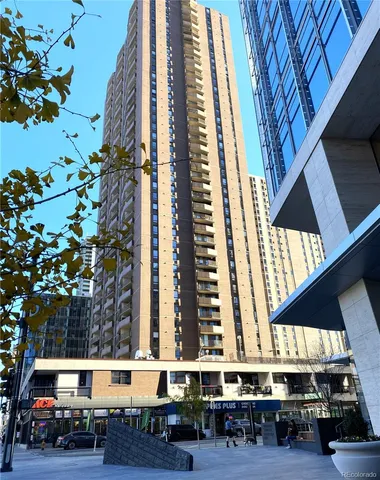 a picture of street with sitting area