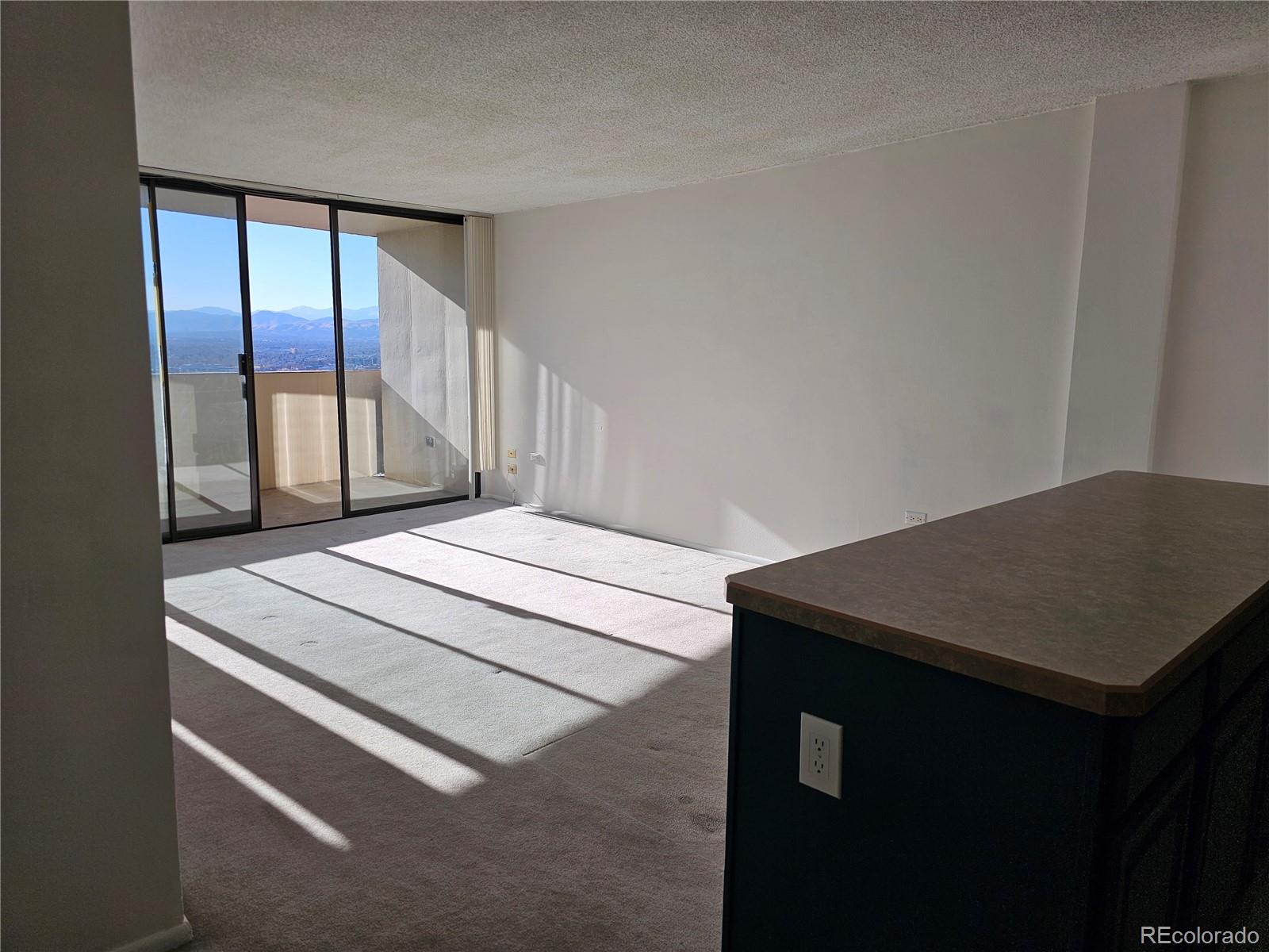 1020 15th Street, Unit 33B Denver, CO 80202 - Photo 18 of 48 a room with a bed and a window