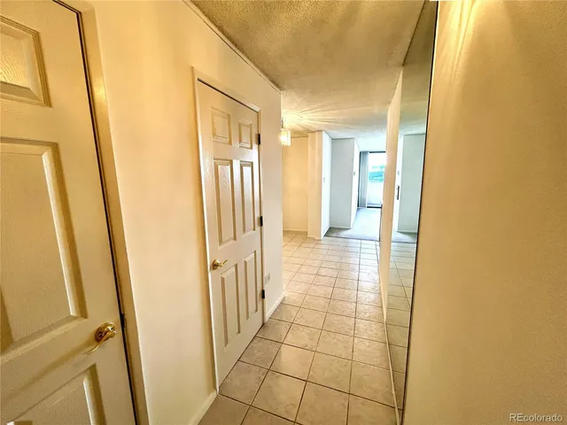 a view of a swimming pool with a yard