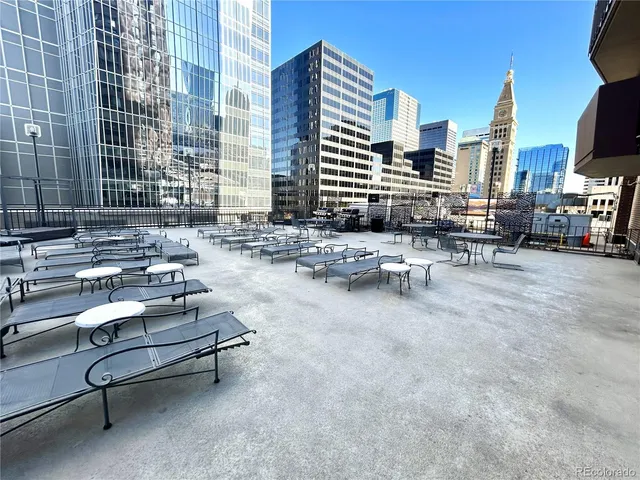 a gym room with lots of chairs and a table