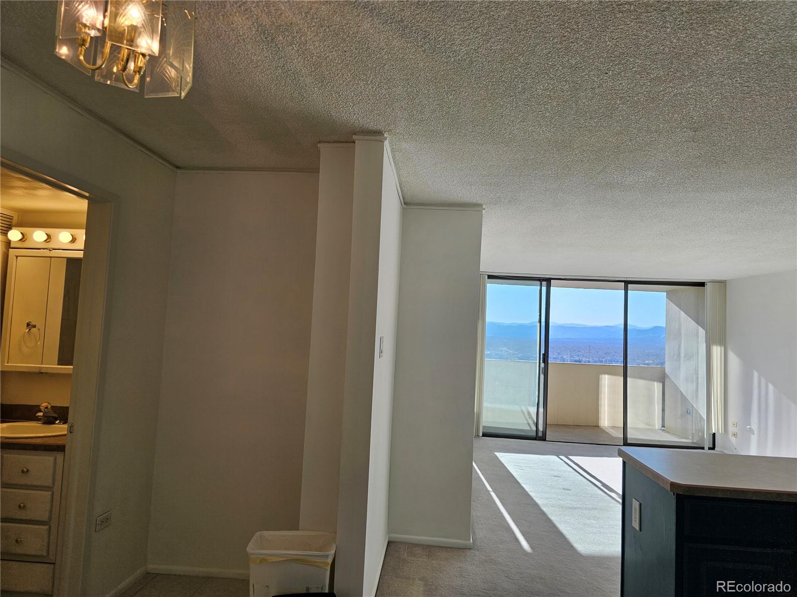 1020 15th Street, Unit 33B Denver, CO 80202 - Photo 32 of 48 a view of a hallway with a elevator