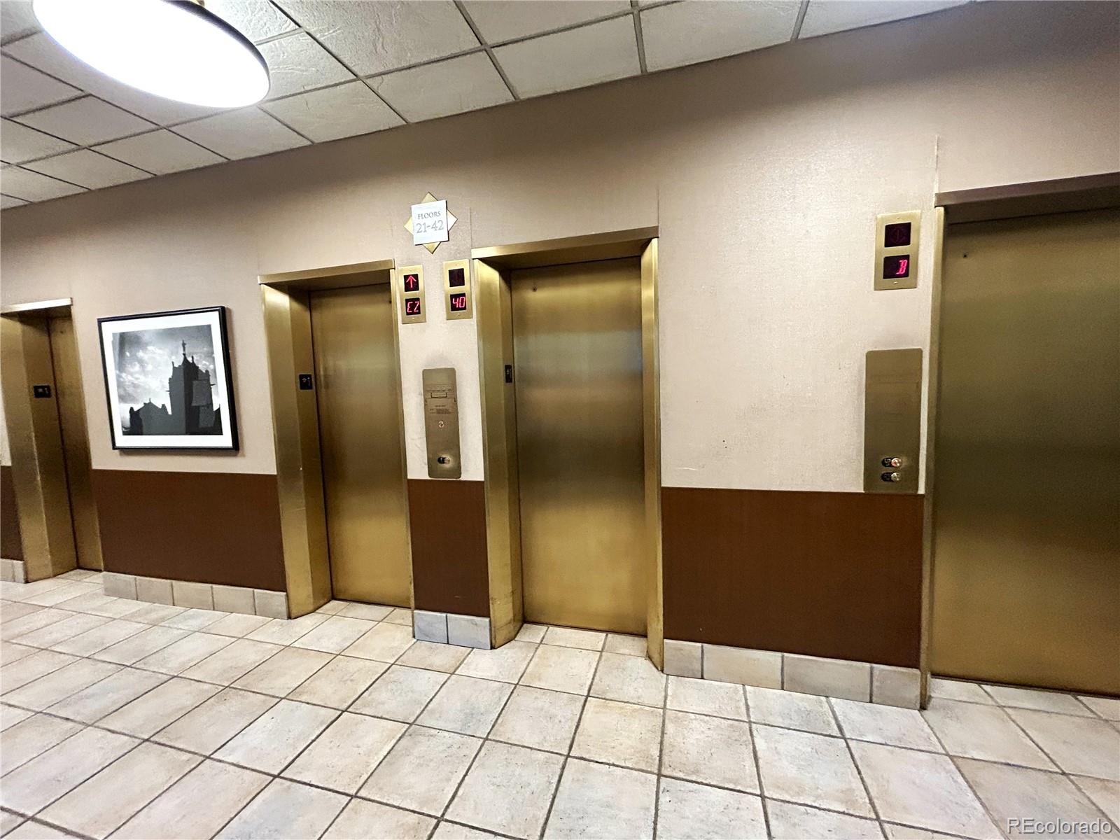 1020 15th Street, Unit 33B Denver, CO 80202 - Photo 38 of 48 a bathroom with a sink and a mirror