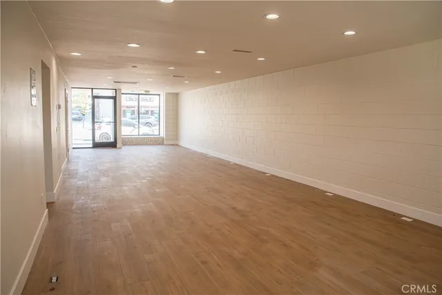 a view of a door and a window