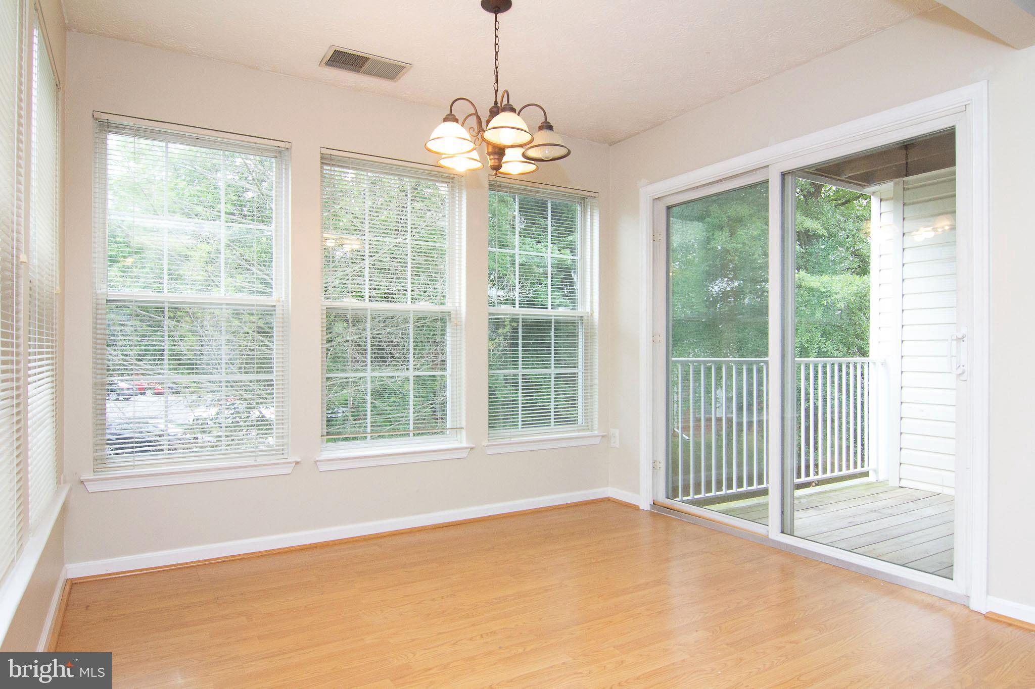 4823 Shellbark Road, Unit 4823 Owings Mills, MD 21117 - Photo 11 of 31 dining/sunroom