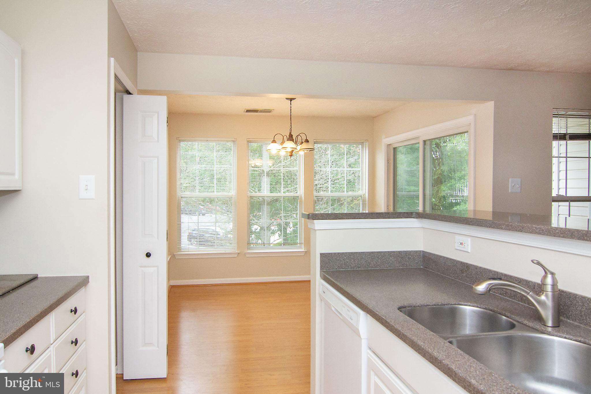 4823 Shellbark Road, Unit 4823 Owings Mills, MD 21117 - Photo 17 of 31 Kitchen view to dining/sunroom