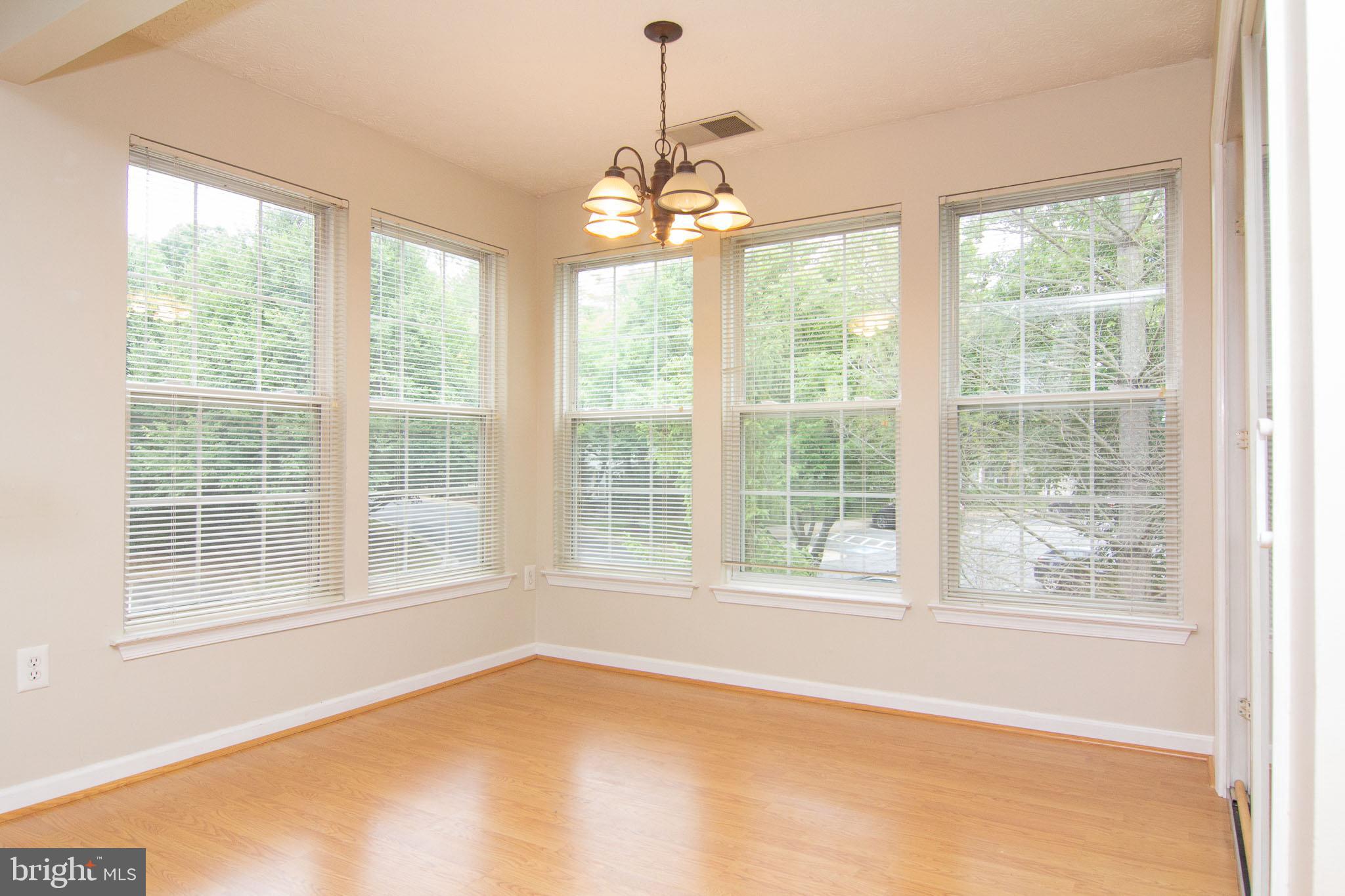 4823 Shellbark Road, Unit 4823 Owings Mills, MD 21117 - Photo 10 of 31 dining/sunroom