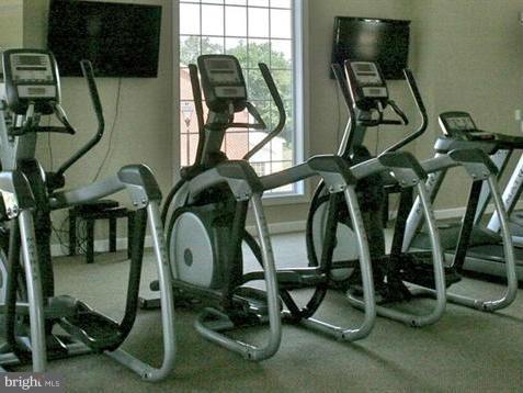 2433 Baileys Pond Road Accokeek, MD 20607 - Photo 5 of 18 a view of a room with gym equipment