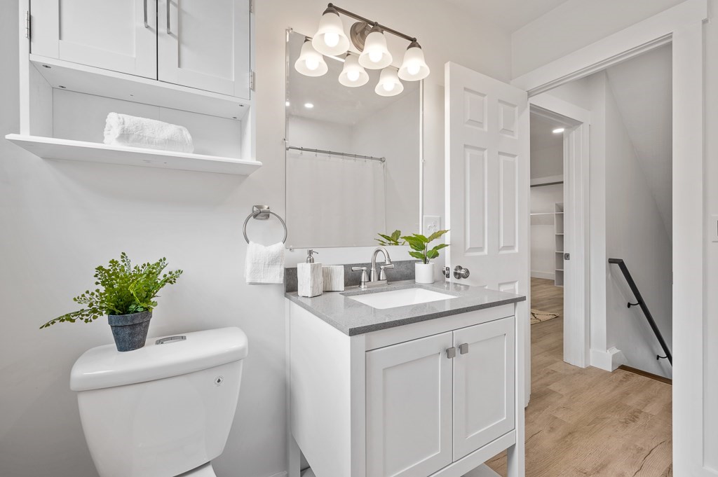 91 Schofield Avenue Dudley, MA 01571 - Photo 18 of 27 a bathroom with a sink and a mirror