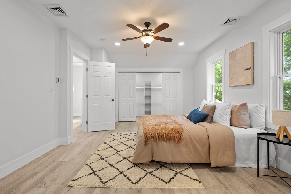 91 Schofield Avenue Dudley, MA 01571 - Photo 21 of 27 a bedroom with bed and a ceiling fan
