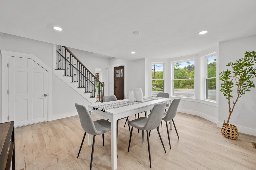 91 Schofield Avenue Dudley, MA 01571 - Photo 3 of 27 a view of a dining room with furniture window and wooden floor