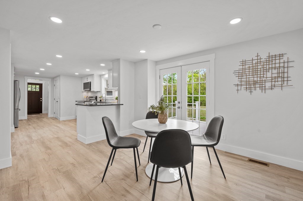 91 Schofield Avenue Dudley, MA 01571 - Photo 6 of 27 a view of a dining room with furniture window and outside view