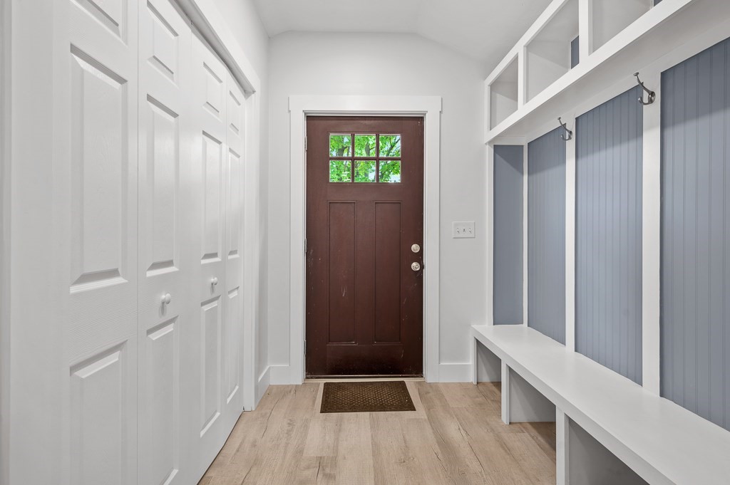 91 Schofield Avenue Dudley, MA 01571 - Photo 9 of 27 a view of an entryway with wooden floor