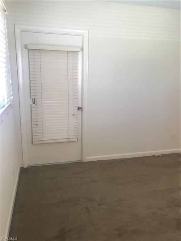 216 Banyan Boulevard, Unit 216 Naples, FL 34102 - Photo 20 of 33 an empty room with an entryway