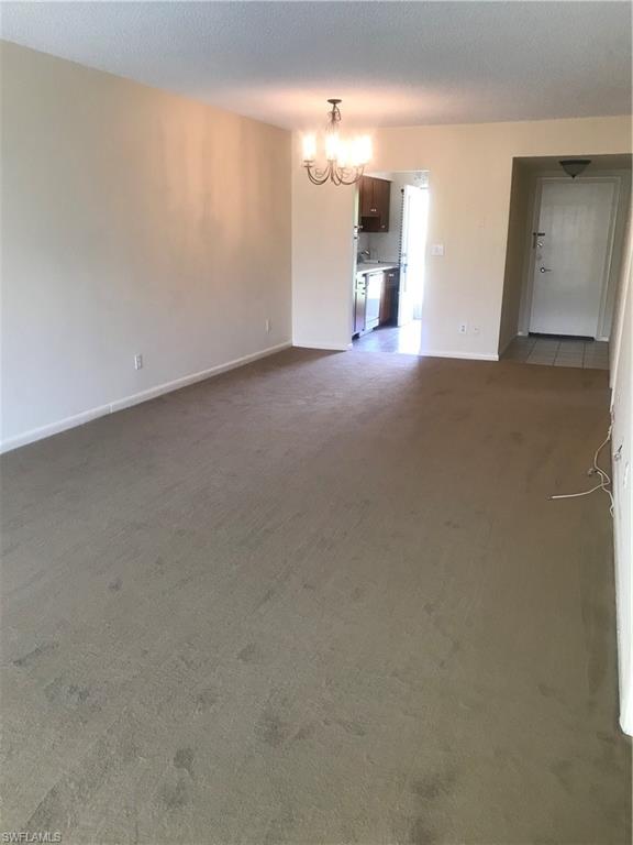 216 Banyan Boulevard, Unit 216 Naples, FL 34102 - Photo 25 of 33 a view of empty room