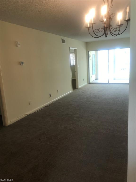 216 Banyan Boulevard, Unit 216 Naples, FL 34102 - Photo 33 of 33 a view of an empty room and window