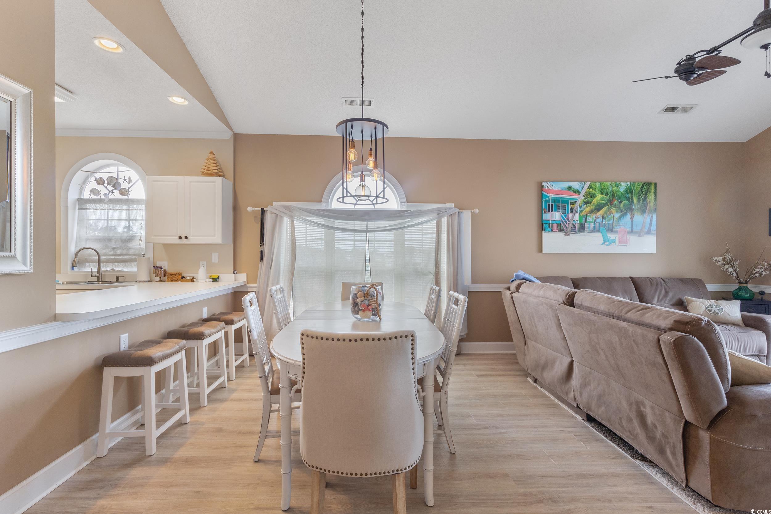 4781 Wild Iris Drive, Unit 301 Myrtle Beach, SC 29577 - Photo 11 of 33 Dining space featuring light wood-style flooring, recessed lighting, and ceiling fan