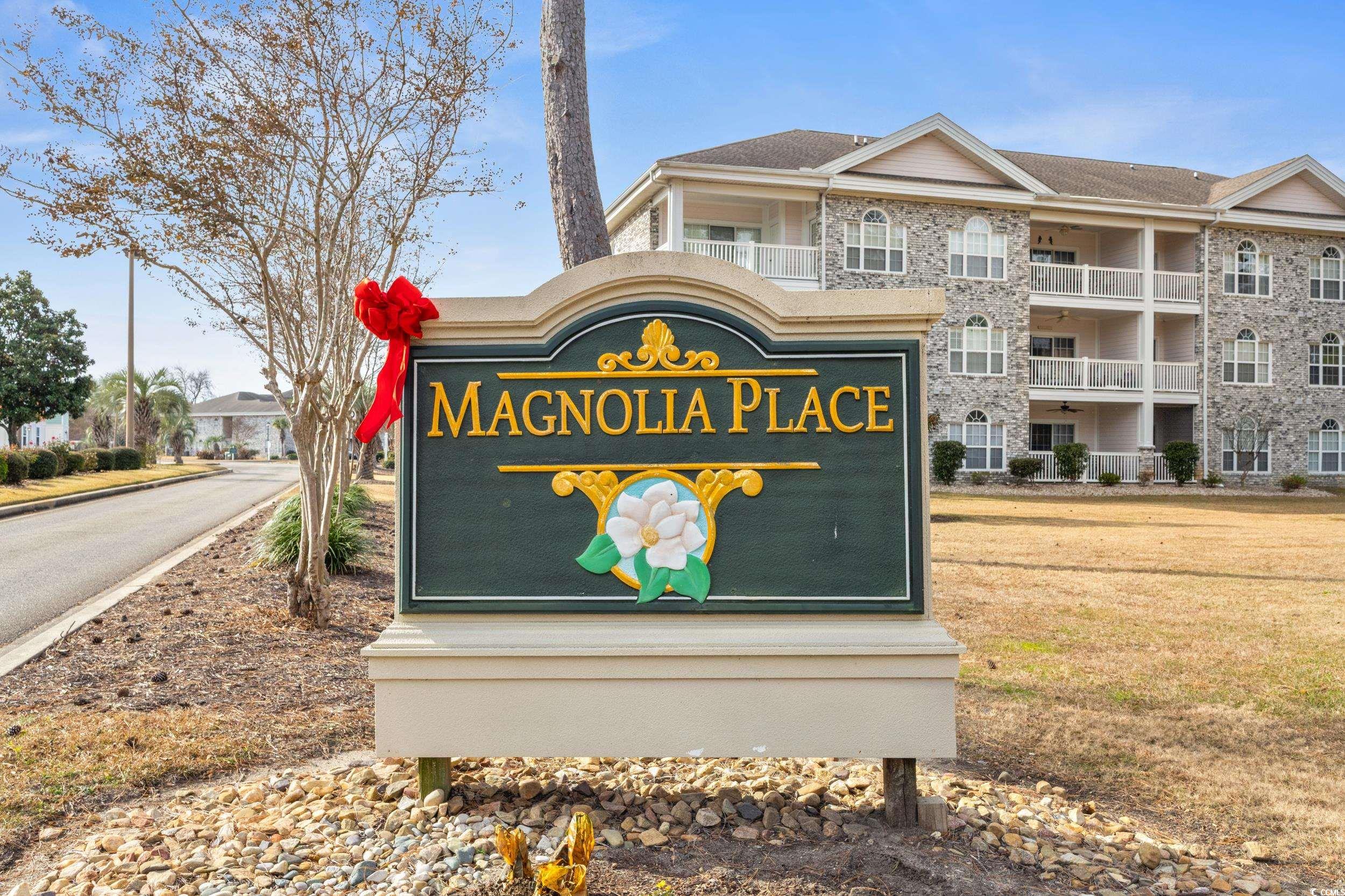 4781 Wild Iris Drive, Unit 301 Myrtle Beach, SC 29577 - Photo 33 of 33 Community pool with a patio