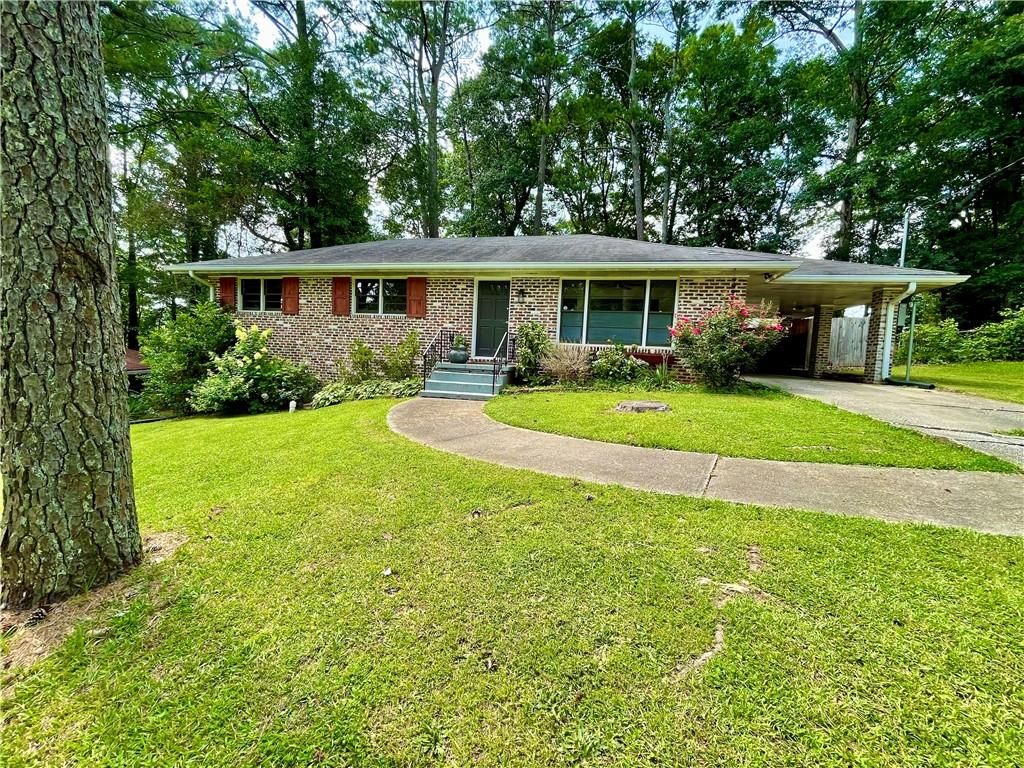 3126 Gay Drive Decatur, GA 30032 - Photo 1 of 1 a view of a house with a yard and sitting area