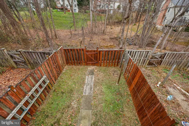 a view of balcony with wooden floor