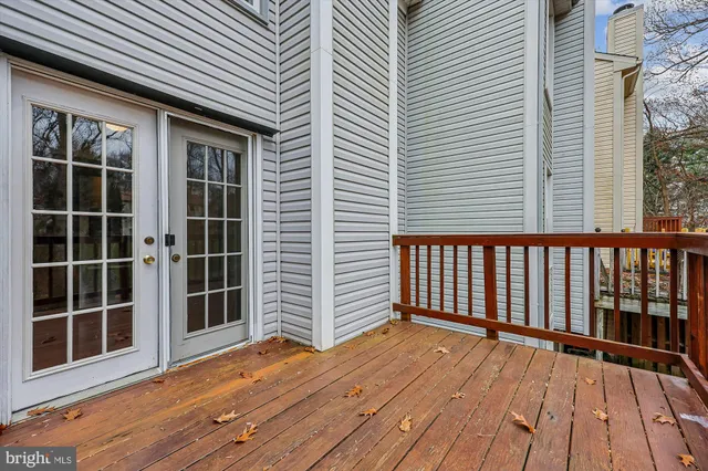 a view of backyard with a balcony