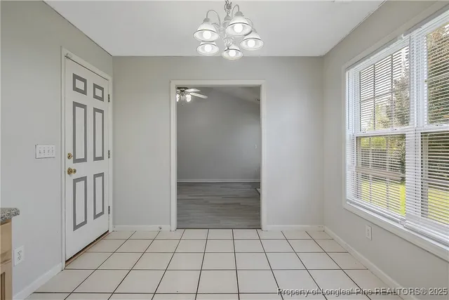 a view of an empty room with window
