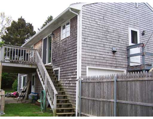 107 Long Meadow Road Portsmouth, RI 02871 - Photo 2 of 8 Exterior Back. DECK AND WALKOUT