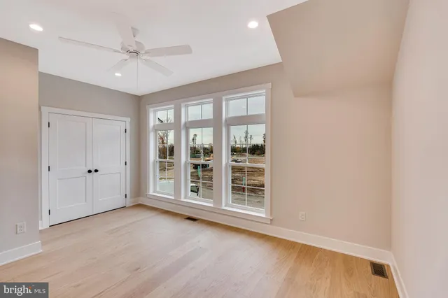 a bathroom with a double vanity sink and a toilet