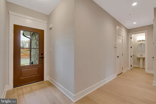 a view of entryway with front door