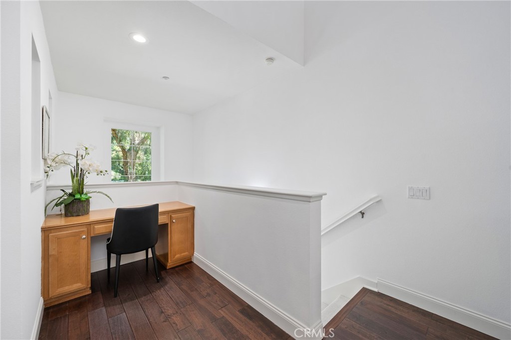 322 Dewdrop Irvine, CA 92603 - Photo 18 of 26 a workspace with furniture and wooden floor