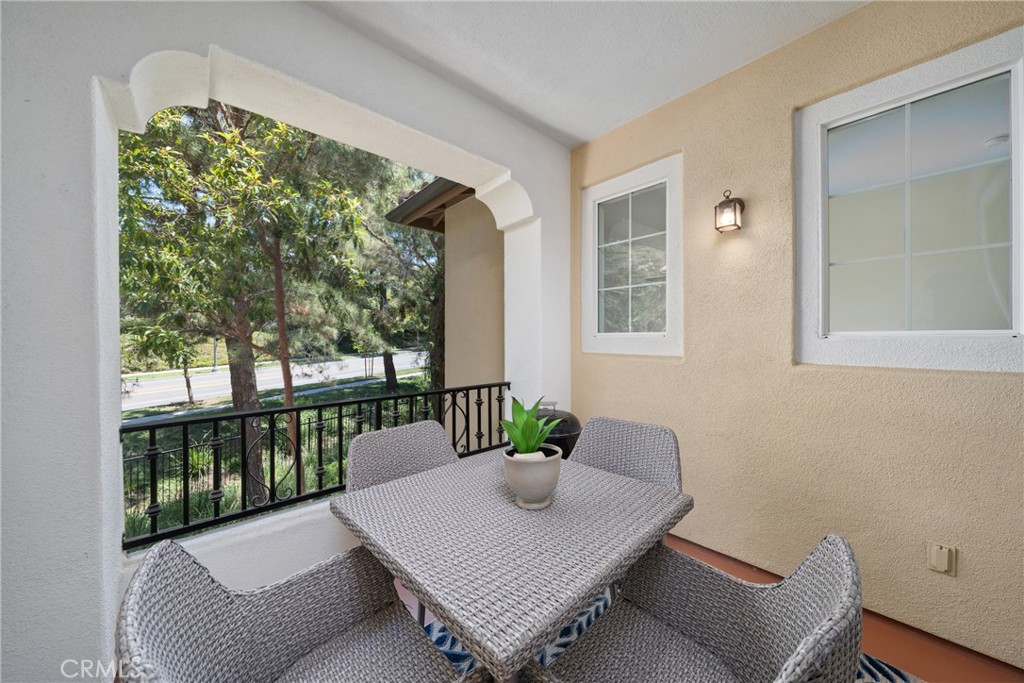 322 Dewdrop Irvine, CA 92603 - Photo 19 of 26 a living room with furniture and a potted plant