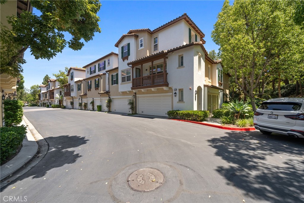 322 Dewdrop Irvine, CA 92603 - Photo 22 of 26 a view of multiple houses with a street