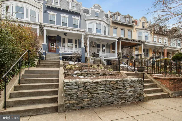 a front view of a building with street view