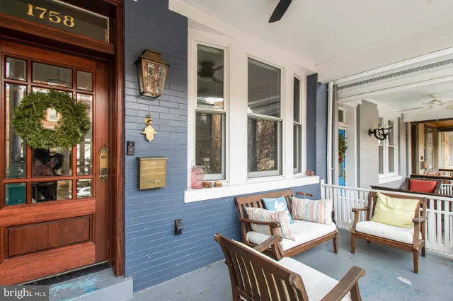 a outdoor space with patio the couches and a potted plant on a table