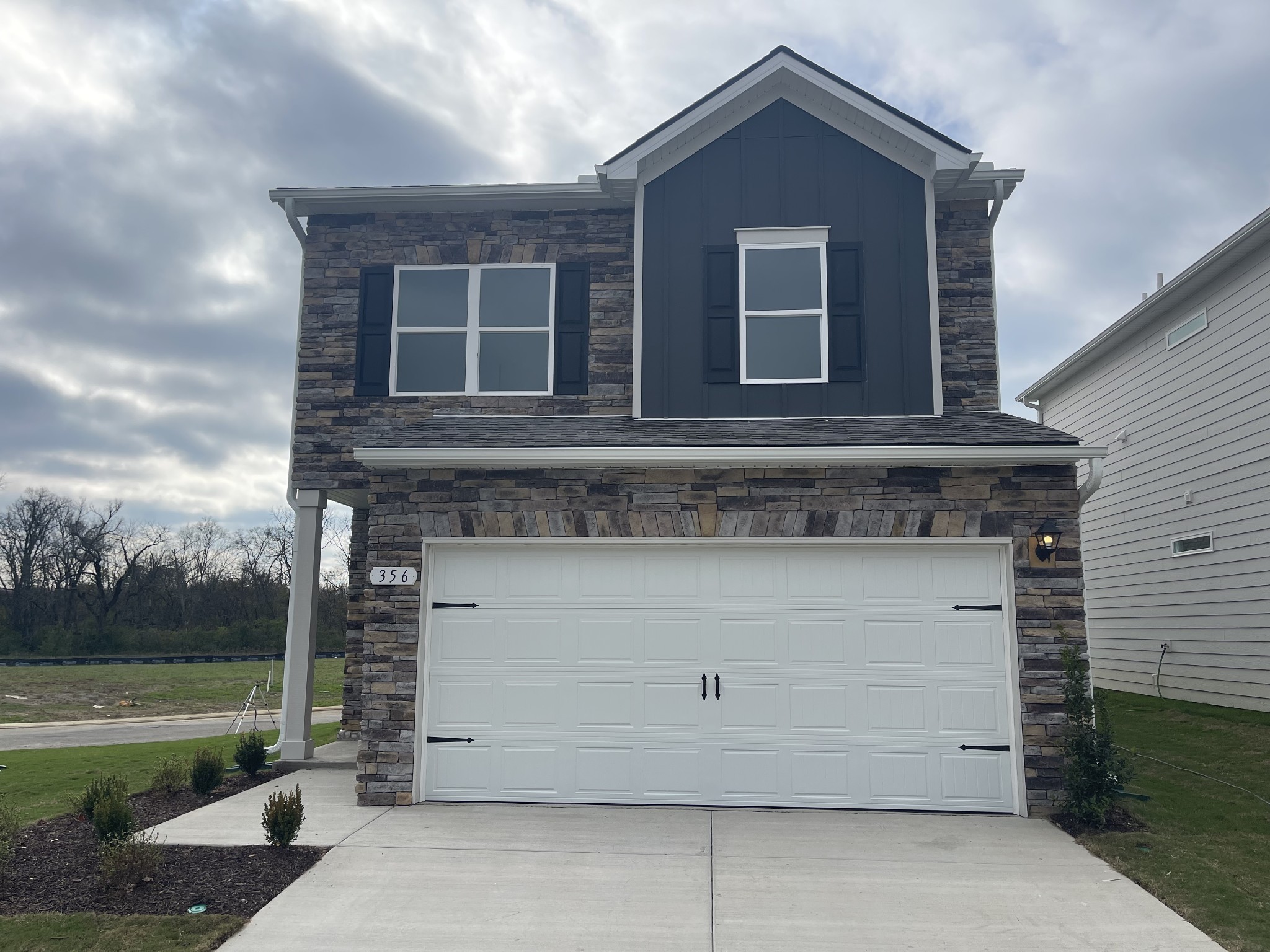 356 Winston Way Gallatin, TN 37066 - Photo 1 of 28 a front view of a house with a yard