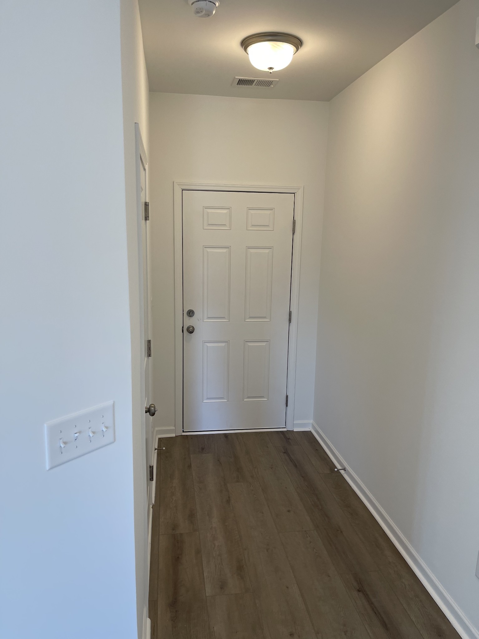 356 Winston Way Gallatin, TN 37066 - Photo 12 of 28 an empty room with wooden floor