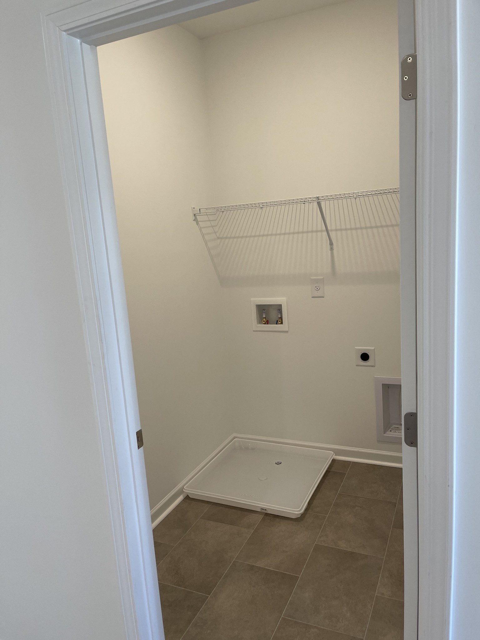 356 Winston Way Gallatin, TN 37066 - Photo 19 of 28 a view of a room with racks on the wall