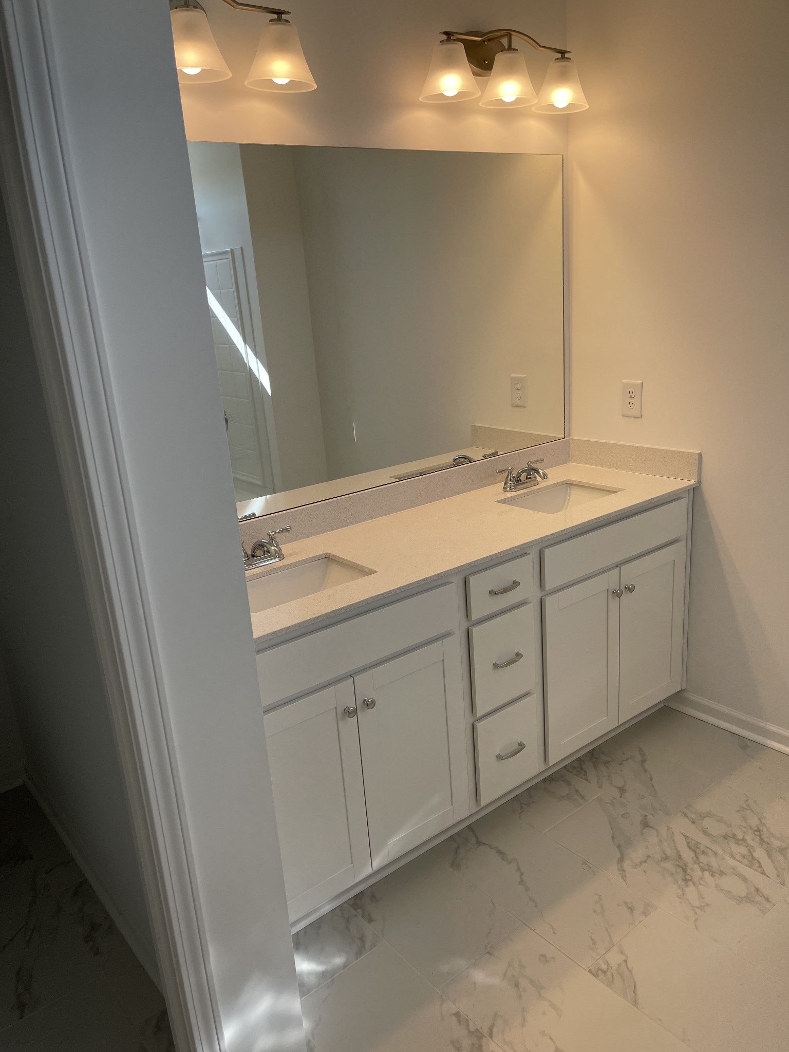 356 Winston Way Gallatin, TN 37066 - Photo 23 of 28 a bathroom with a double vanity sink and mirror